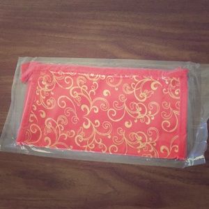 Vintage red zip up makeup bag.